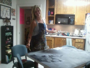 Painting a large piece of art for my collegiate senior show in our dorm room kitchen