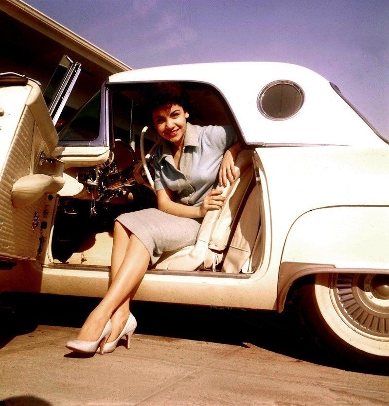 Annette Funicello sitting in her Thunderbird, 1959